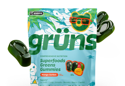 Grüns Superfoods Greens Gummies Mango Sorbet packaging with gummies floating around