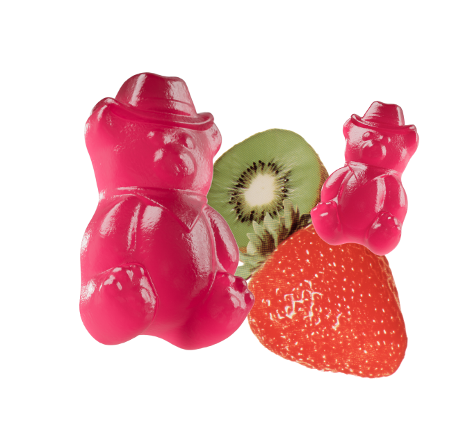 Pink gummy bears with a kiwi slice and strawberry