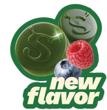 Two round green gummies embossed with an "S" logo, paired with a fresh raspberry and blueberry, above a "new flavor" text banner outlined in green, on a transparent checkered background.