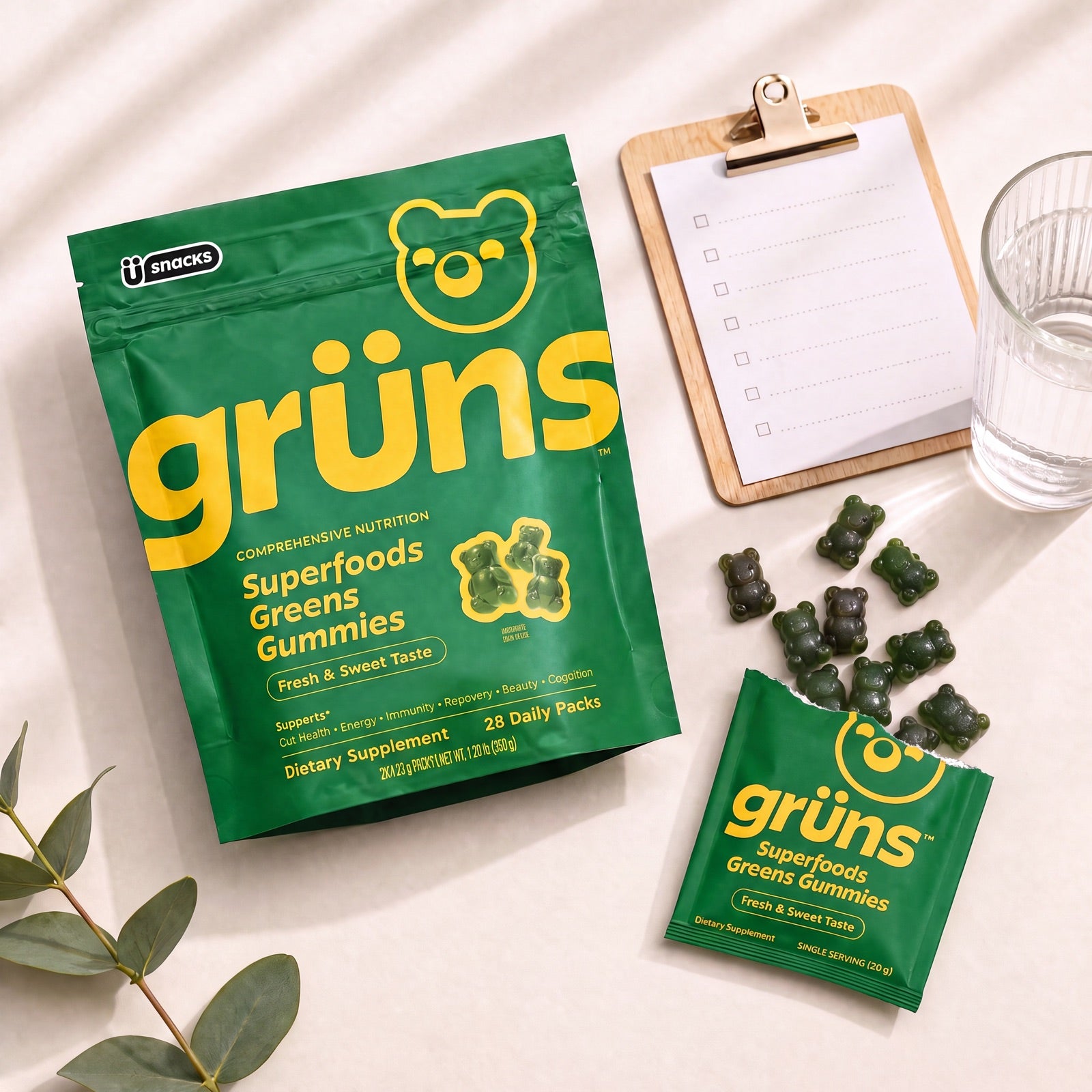 Grüns daily pack with a wellness checklist and water