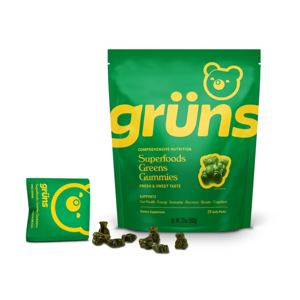 Green bag of superfoods greens gummies with small gummies scattered below.